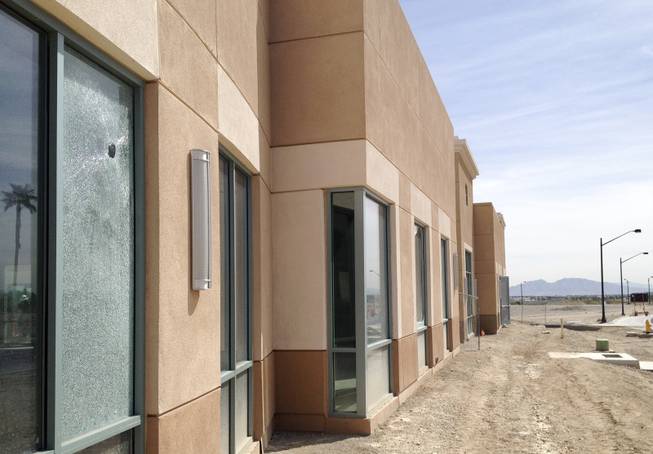 An office building onsite at the mothballed medical-office project Centennial Hills Center shows signs of vandalism March 20, 2014.  The center has new ownership and is slated for completion after being abandoned by collapsed lender Lehman Brothers.